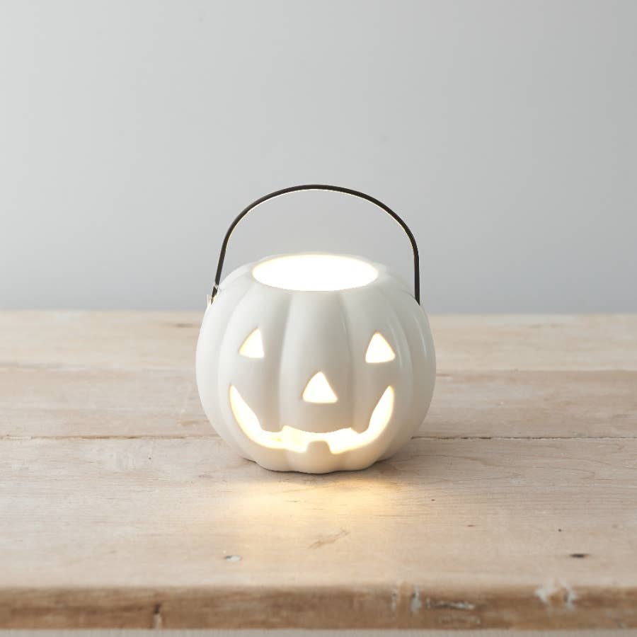 witte theelichthouder in de vorm van een pompoen halloween herfstdecoratie